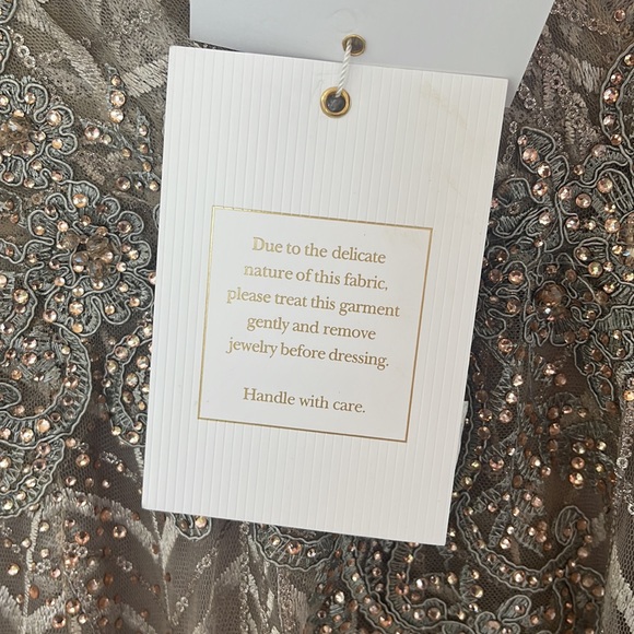 Ieena Mac Duggal - Embellished Illusion Long Sleeve Taupe A-line Gown - Picture 16 of 17